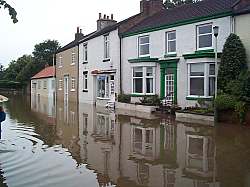 Hoping the sand bags will keep the water out.